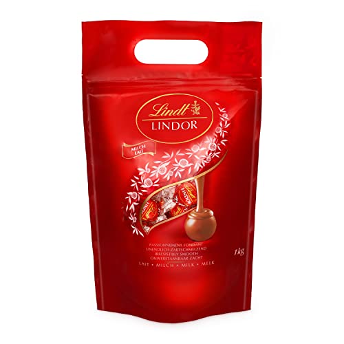 Lindt LINDOR Schokoladen Kugeln Vollmilch | 1 kg Beutel, wiederverschließbar | ca. 80 Schokoladen Kugeln Milch-Schokolade mit zartschmelzender Füllung | Großpackung, Pralinen-Geschenk